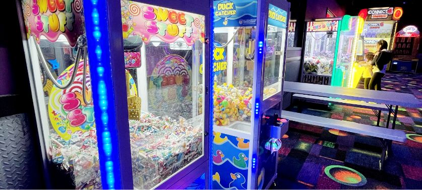 Claw machine games in the arcade at Summit